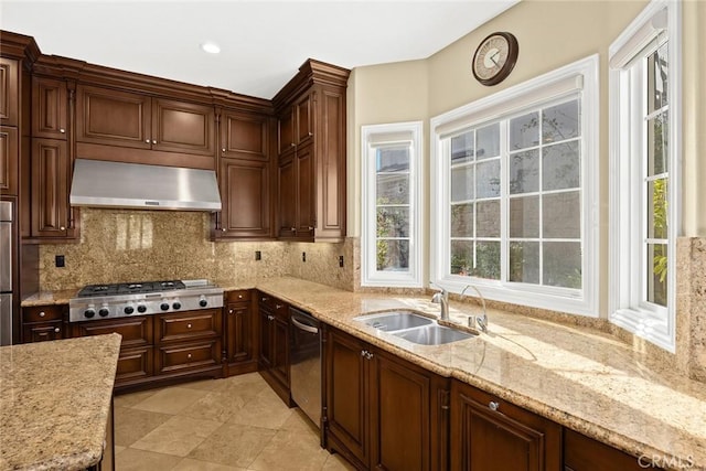 18345 Watson Way, Yorba Linda, CA 92886 - kitchen featuring appliances with stainless steel finishes, light stone counters, a sink, ventilation hood, and decorative backsplash