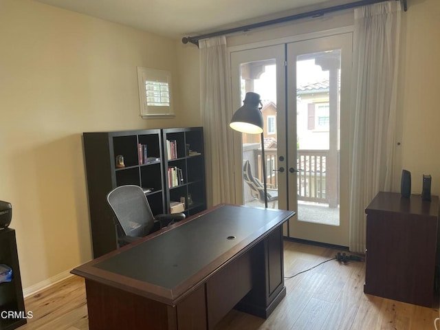 1117 Patel Pl, Duarte, CA 91010 - office area with baseboards, french doors, and light wood-style flooring