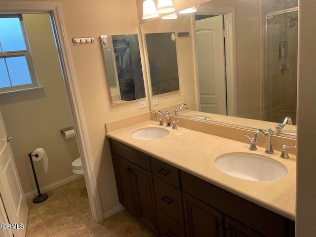 1117 Patel Pl, Duarte, CA 91010 - full bathroom featuring a sink, a stall shower, toilet, and double vanity