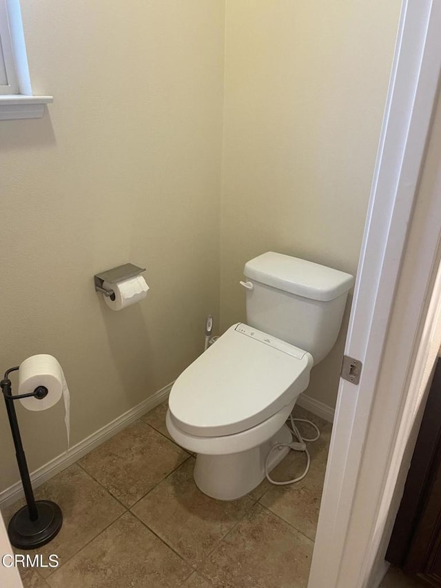 1117 Patel Pl, Duarte, CA 91010 - bathroom featuring baseboards, tile patterned floors, and toilet
