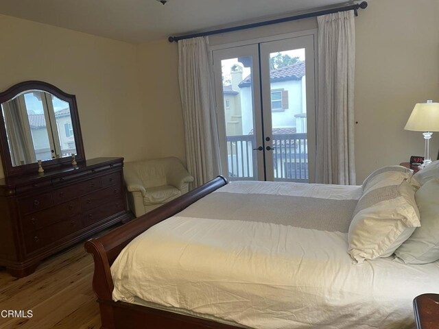 1117 Patel Pl, Duarte, CA 91010 - bedroom featuring access to outside, french doors, wood finished floors, and multiple windows