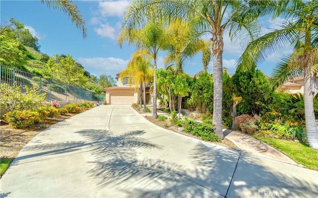 2161 S Ferrier Ct, La Habra, CA 90631 - surrounding community with a garage, fence, and concrete driveway