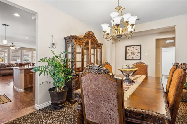 dining room featuring recessed lighting, dark wood-style floors, and ceiling fan with notable chandelier