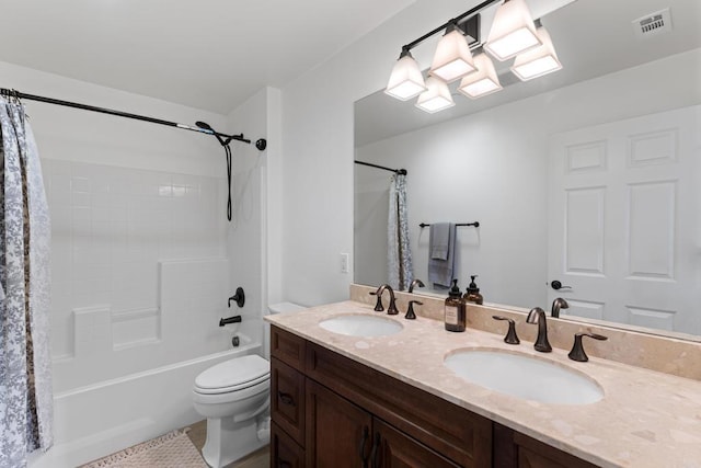 bathroom with toilet, visible vents, a sink, and shower / tub combo with curtain