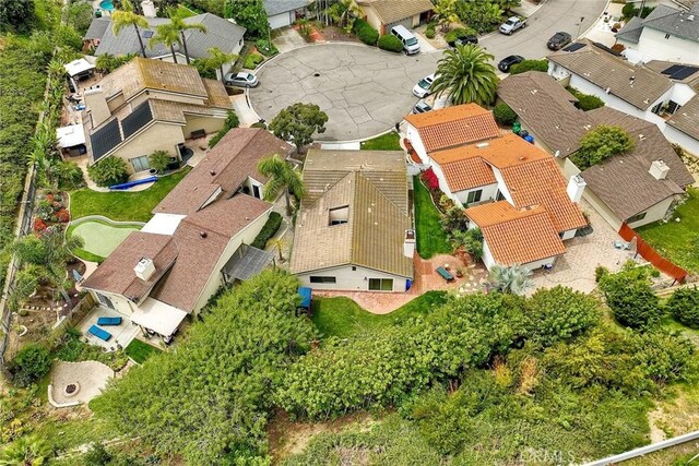 birds eye view of property with a residential view