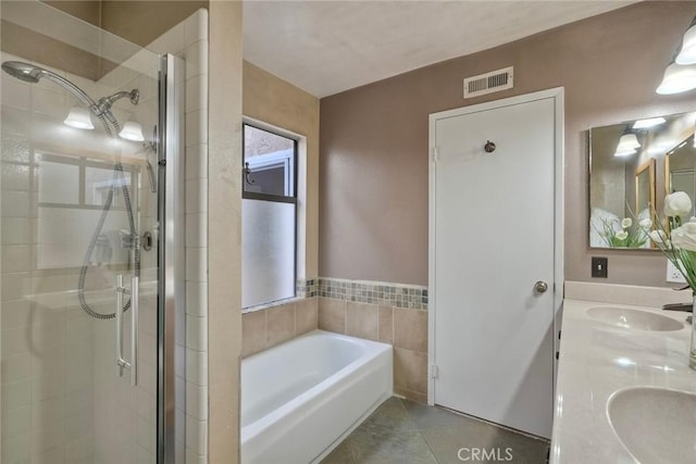 7553 Agua Dulce Ct, Carlsbad, CA 92009 - bathroom featuring a shower stall, double vanity, a garden tub, and tile patterned floors