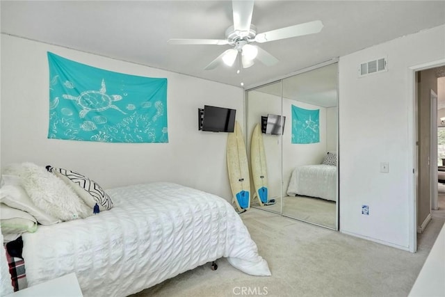 7553 Agua Dulce Ct, Carlsbad, CA 92009 - carpeted bedroom with a closet and ceiling fan