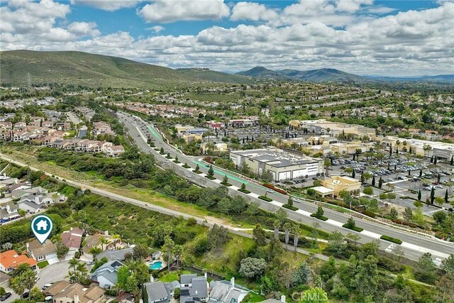 birds eye view of property featuring a residential view and a mountain view