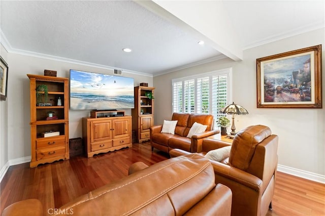 living area featuring baseboards, recessed lighting, and wood finished floors