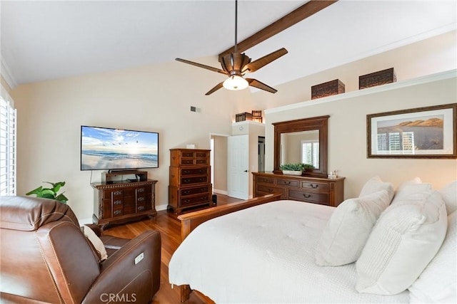 bedroom with ceiling fan, visible vents, wood finished floors, baseboards, and lofted ceiling with beams