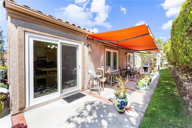 view of patio featuring outdoor dining area