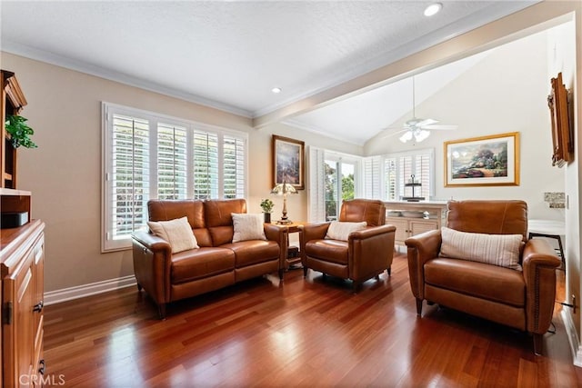 living room featuring ceiling fan, dark wood-style flooring, crown molding, baseboards, and lofted ceiling