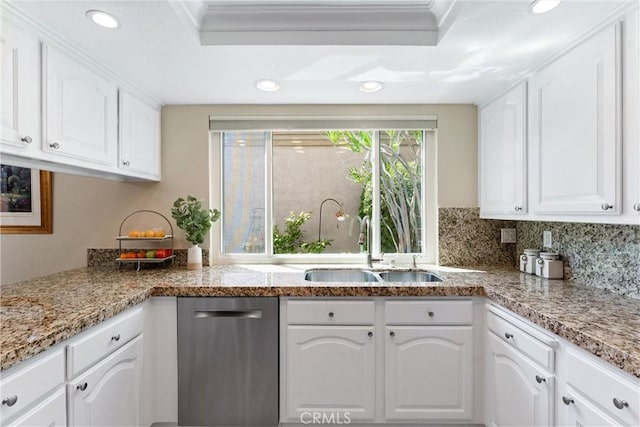kitchen featuring a sink, white cabinets, recessed lighting, and dishwasher