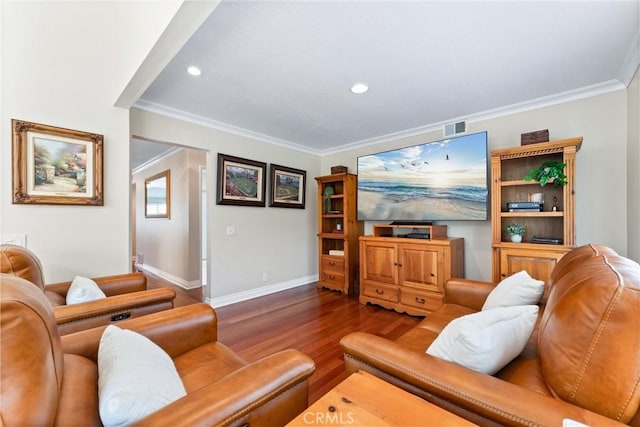 living room with crown molding, baseboards, recessed lighting, and wood finished floors