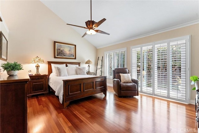 bedroom featuring crown molding, access to exterior, and wood finished floors