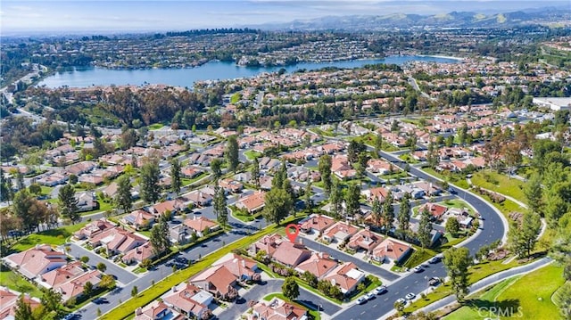 aerial view featuring a water view and a residential view