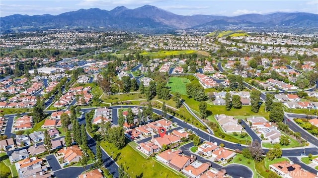 bird's eye view featuring a residential view and a mountain view