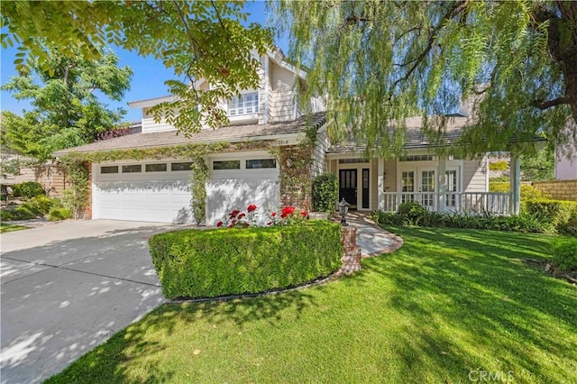 27118 Highlands Ln, Valencia, CA 91354 - view of front of home with driveway, a front yard, and a garage