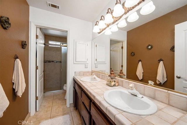 315 Alder St, Arroyo Grande, CA 93420 - full bath with a sink, a tile shower, double vanity, and visible vents