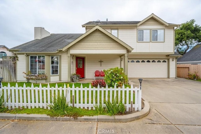 315 Alder St, Arroyo Grande, CA 93420 - view of front of property featuring concrete driveway, an attached garage, a fenced front yard, and a front yard