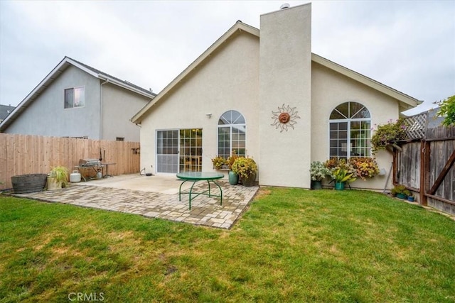 315 Alder St, Arroyo Grande, CA 93420 - rear view of house with a fenced backyard, a patio area, stucco siding, and a yard