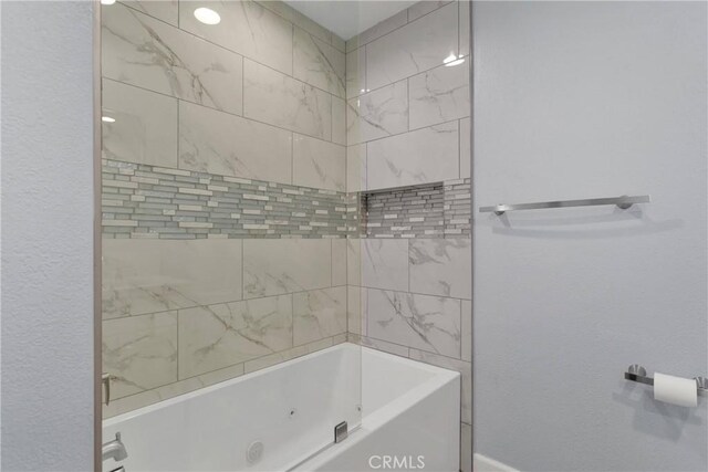 full bath featuring a combined bath / shower with jetted tub