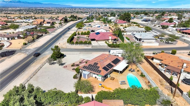 bird's eye view featuring a mountain view and a residential view