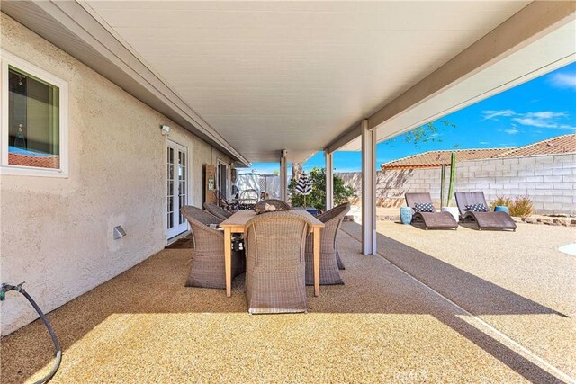 view of patio / terrace with fence and outdoor dining area