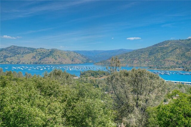 property view of mountains featuring a water view