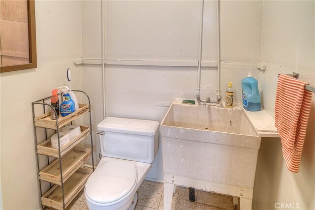 bathroom featuring toilet
