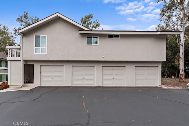 garage featuring driveway