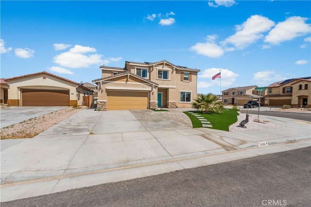 view of front of property featuring stone siding, stucco siding, concrete driveway, a residential view, and solar panels