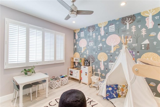 playroom featuring baseboards, ceiling fan, recessed lighting, and wood finished floors