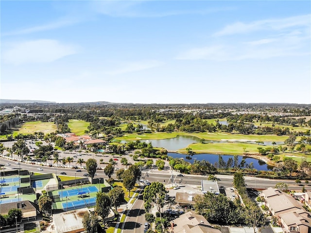 aerial view featuring a water view, view of golf course, and a residential view