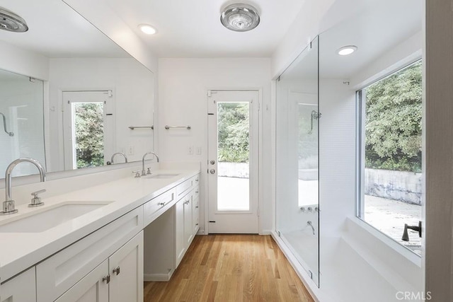 3325 Alana Dr, Sherman Oaks, CA 91403 - interior space featuring a sink, light wood-type flooring, and a wealth of natural light