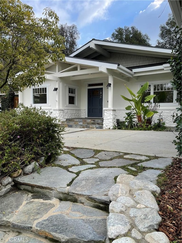 3325 Alana Dr, Sherman Oaks, CA 91403 - view of front of house with stone siding and stucco siding
