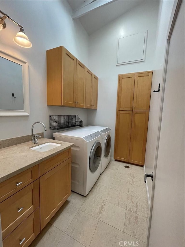 3325 Alana Dr, Sherman Oaks, CA 91403 - washroom featuring cabinet space, a sink, light tile patterned floors, a high ceiling, and washer and clothes dryer
