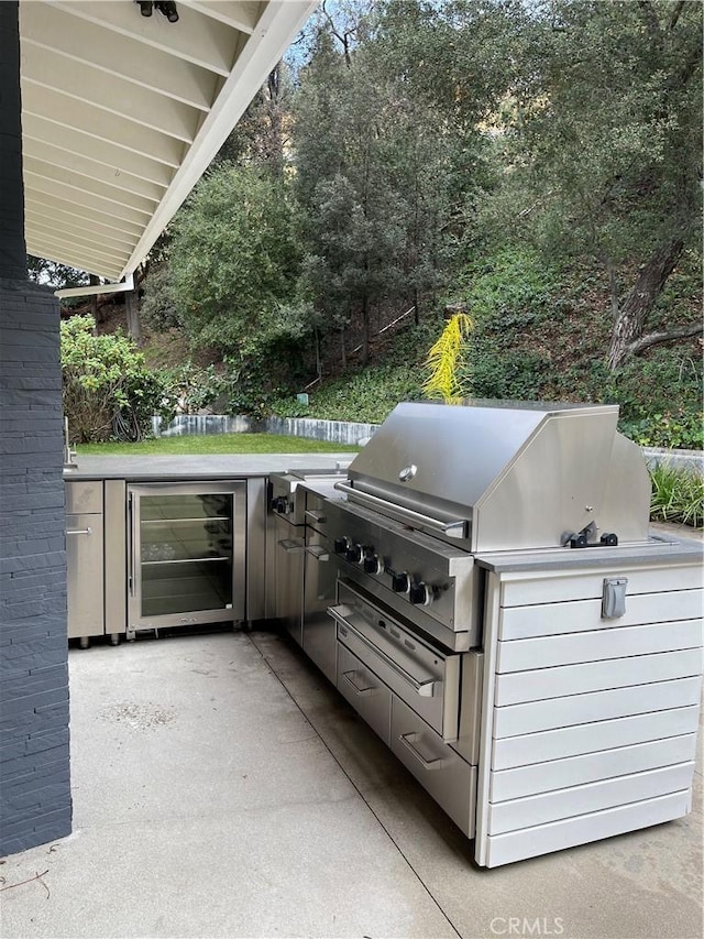 3325 Alana Dr, Sherman Oaks, CA 91403 - view of patio / terrace with wine cooler, exterior kitchen, and area for grilling