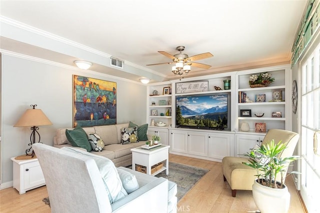 22435 Silver Spur, Lake Forest, CA 92630 - living room with crown molding, visible vents, light wood-style floors, and a wealth of natural light