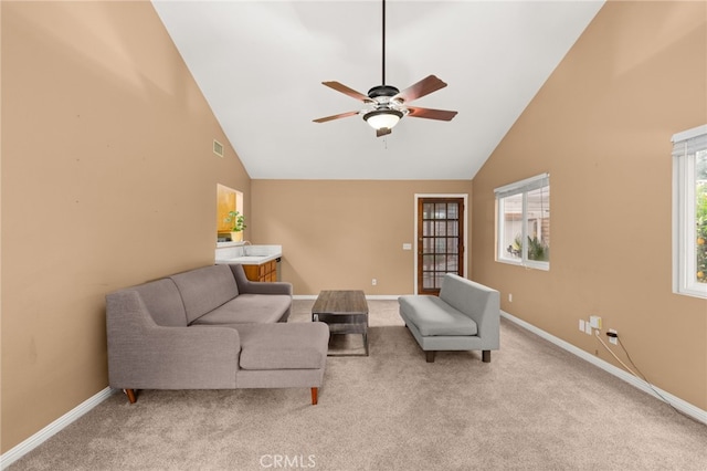 8757 San Vicente Ave, Riverside, CA 92503 - living room featuring high vaulted ceiling, ceiling fan, baseboards, and carpet floors