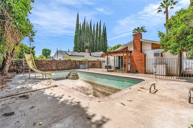 7038 Mclennan Ave, Lake Balboa, CA 91406 - view of swimming pool with fence, a water slide, a patio, and a fenced in pool