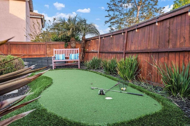 view of yard featuring a fenced backyard