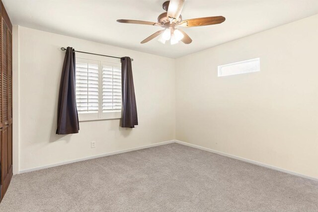 1265 Dawnridge Ave, El Cajon, CA 92021 - empty room featuring carpet, a ceiling fan, and baseboards