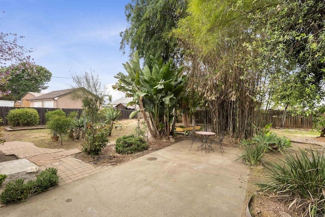 1265 Dawnridge Ave, El Cajon, CA 92021 - fenced backyard featuring a patio and outdoor dining area