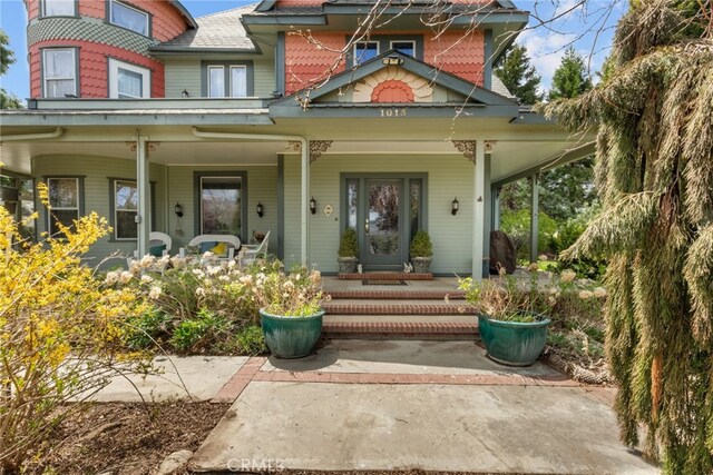 entrance to property with covered porch
