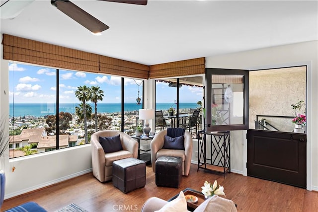 100 Calle Patricia Unit 1A, San Clemente, CA 92672 - sunroom / solarium featuring a water view, wood finished floors, and baseboards