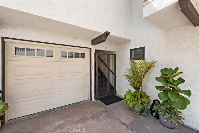 property entrance featuring stucco siding