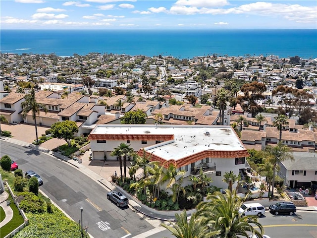 bird's eye view with a water view and a residential view