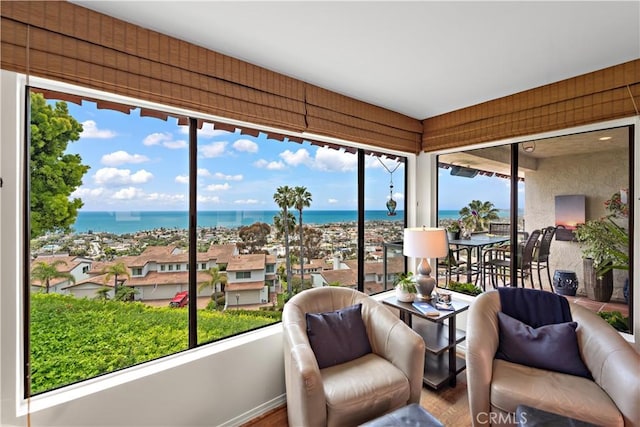 100 Calle Patricia Unit 1A, San Clemente, CA 92672 - sunroom featuring a water view and wood finished floors