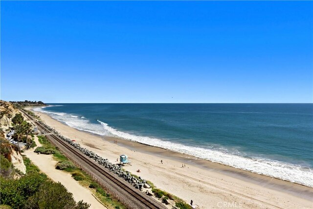 view of water feature with a beach view